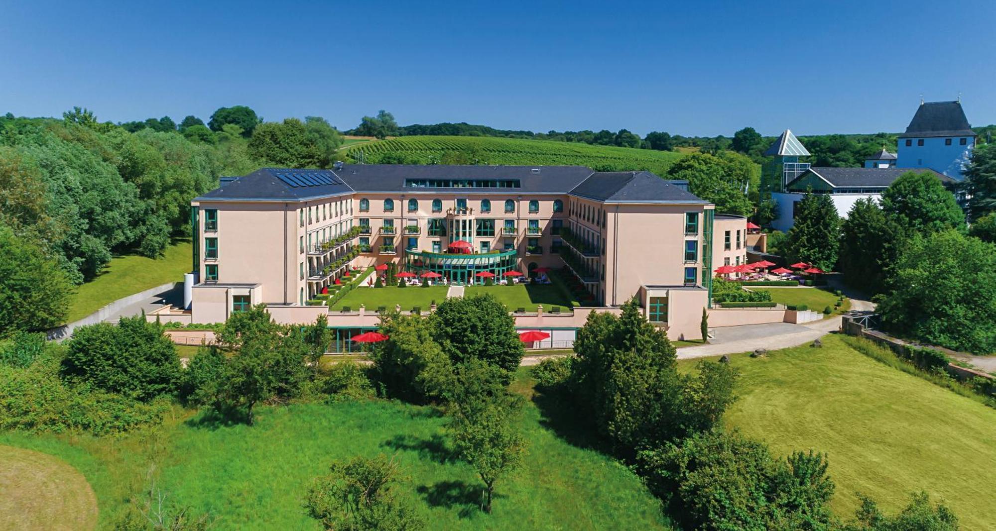 Victor'S Residenz-Hotel Schloss Berg Nennig Exterior photo Aerial view of the campus